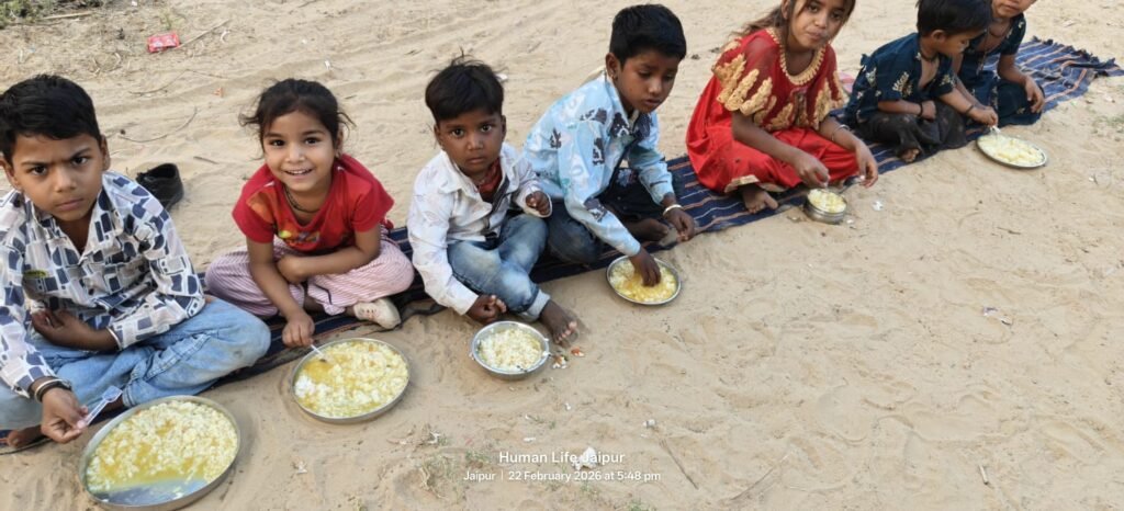 feeding slum children rice and chole