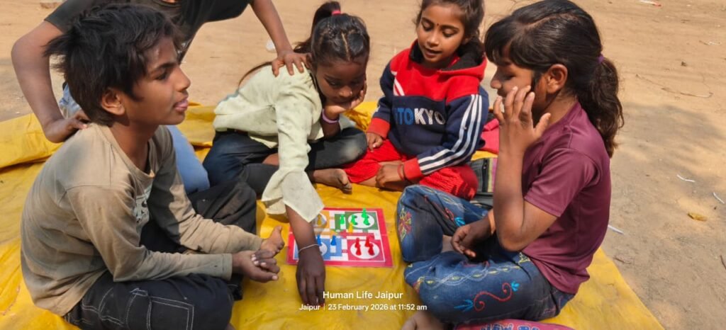 slum children playing and enjoying in hlf school