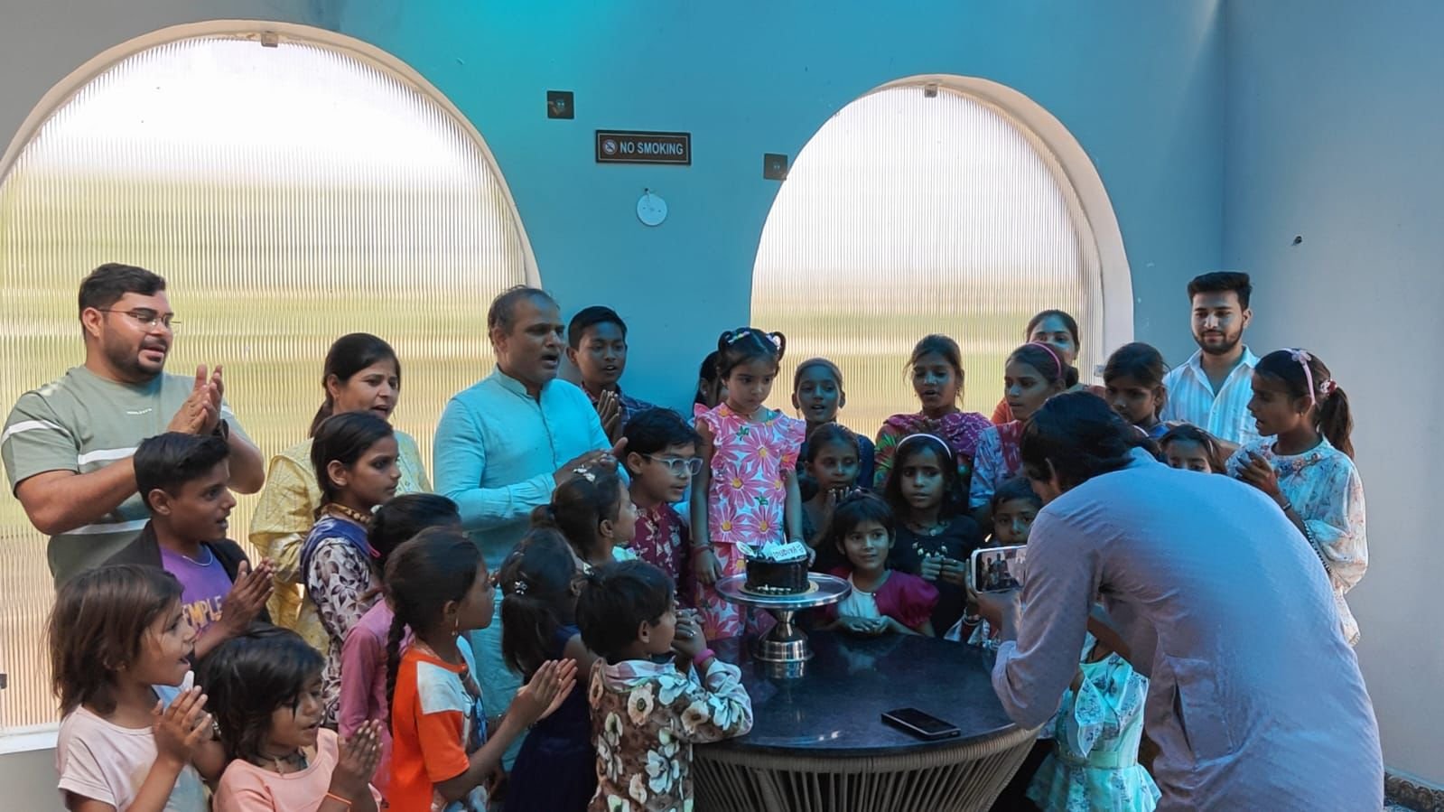 celebrating birthday with poor kids