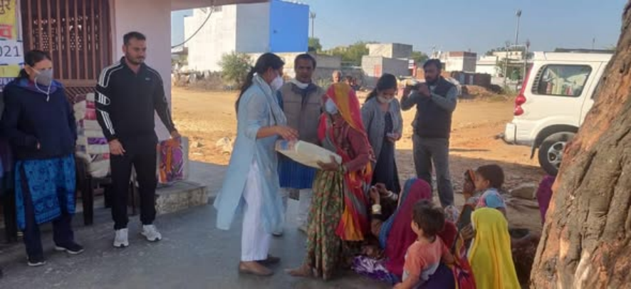Distribution of Clothing and Grocery Items